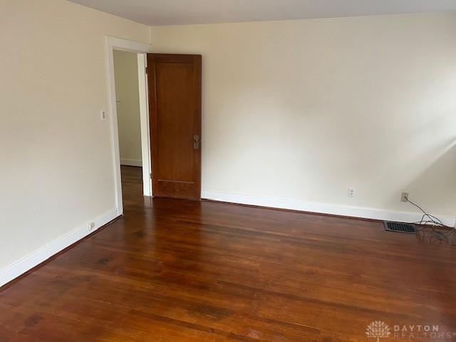 417 Sandalwood Dr, Dayton, OH 45405 - empty room with baseboards and wood finished floors