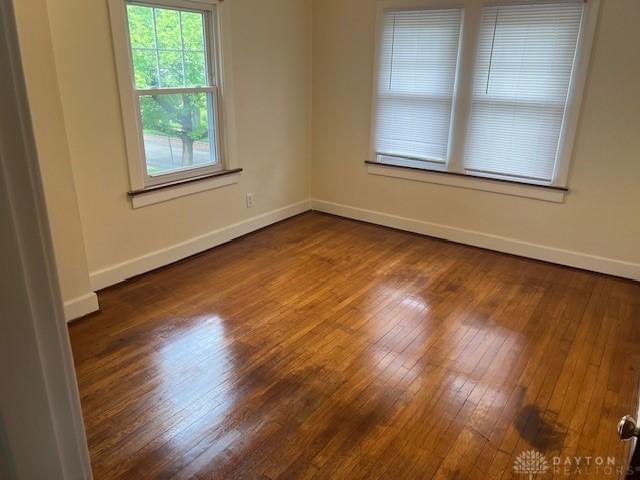 417 Sandalwood Dr, Dayton, OH 45405 - unfurnished room with dark wood finished floors