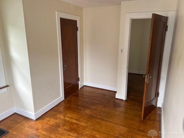 417 Sandalwood Dr, Dayton, OH 45405 - spare room with wood finished floors and baseboards