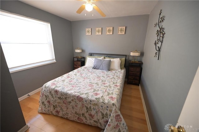 228 E Bruce Ave, Dayton, OH 45405 - bedroom with baseboards and a ceiling fan