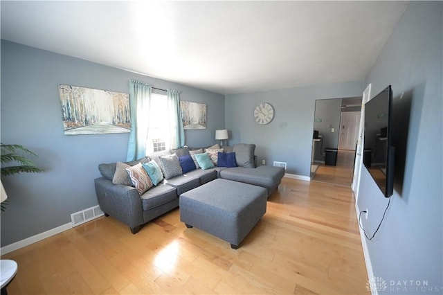 228 E Bruce Ave, Dayton, OH 45405 - living room featuring light wood finished floors