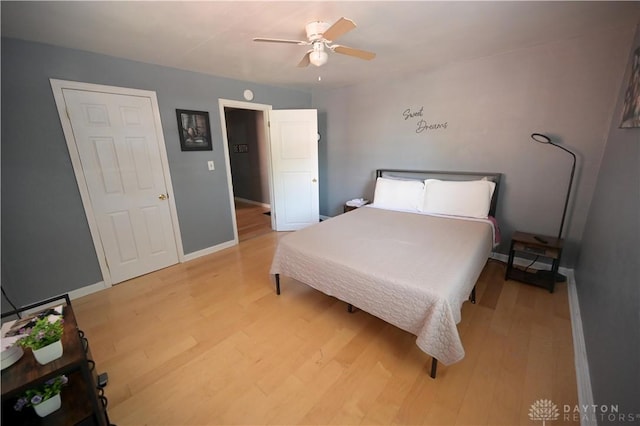 228 E Bruce Ave, Dayton, OH 45405 - bedroom with light wood-style floors and ceiling fan