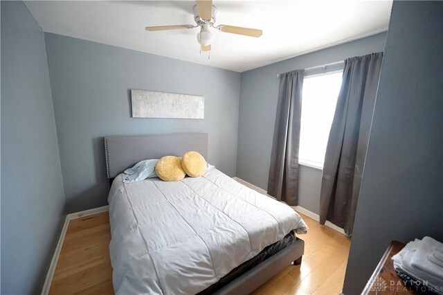 228 E Bruce Ave, Dayton, OH 45405 - bedroom featuring light wood-style flooring and a ceiling fan