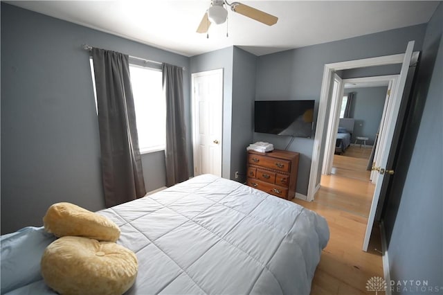 228 E Bruce Ave, Dayton, OH 45405 - bedroom with wood finished floors and a ceiling fan