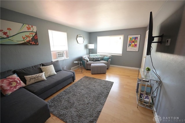 228 E Bruce Ave, Dayton, OH 45405 - living room featuring plenty of natural light, light wood-style floors, and cooling unit