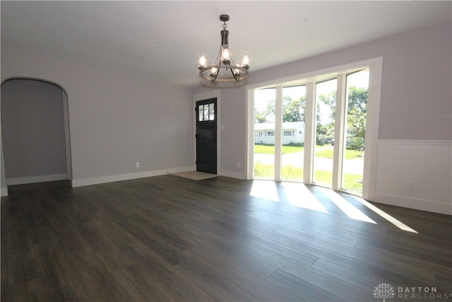 412 Cedar Ln, Lebanon, OH 45036 - spare room with a chandelier and dark wood-type flooring