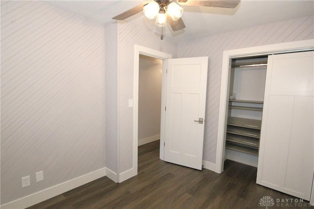 412 Cedar Ln, Lebanon, OH 45036 - unfurnished bedroom with dark wood-style floors, a closet, and ceiling fan