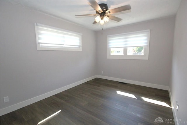 412 Cedar Ln, Lebanon, OH 45036 - empty room featuring healthy amount of natural light, ceiling fan, and wood finished floors