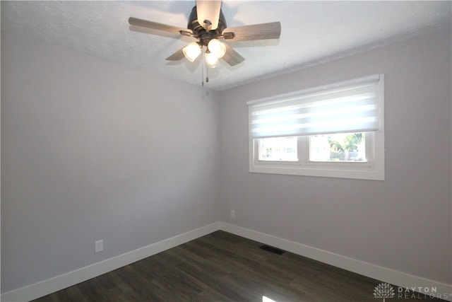 412 Cedar Ln, Lebanon, OH 45036 - empty room with dark wood-style flooring and ceiling fan