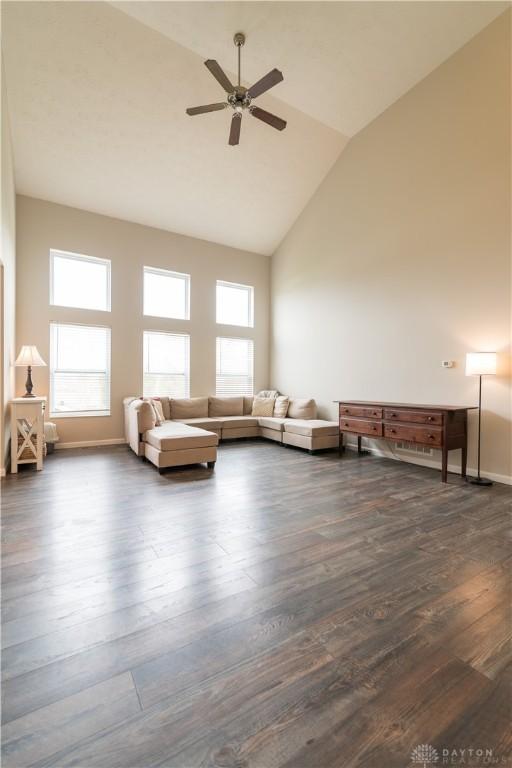 4005 Clearstream Way, Englewood, OH 45322 - living area featuring a ceiling fan, dark wood finished floors, and high vaulted ceiling