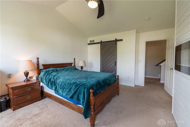 4005 Clearstream Way, Englewood, OH 45322 - bedroom with carpet, lofted ceiling, a barn door, and a ceiling fan