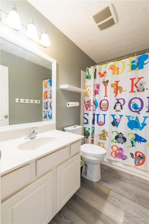 4005 Clearstream Way, Englewood, OH 45322 - full bath featuring vanity, wood finished floors, and a shower with curtain