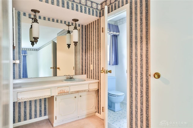 798 Carini Ln, Cincinnati, OH 45218 - bathroom featuring wallpapered walls and vanity
