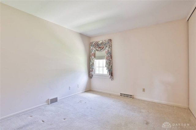798 Carini Ln, Cincinnati, OH 45218 - spare room featuring carpet flooring and baseboards