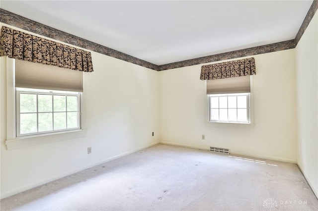 798 Carini Ln, Cincinnati, OH 45218 - spare room with healthy amount of natural light and carpet floors