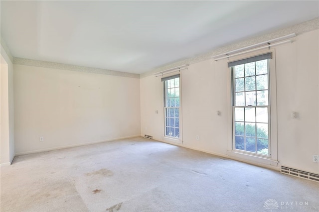 798 Carini Ln, Cincinnati, OH 45218 - unfurnished room featuring healthy amount of natural light and carpet floors