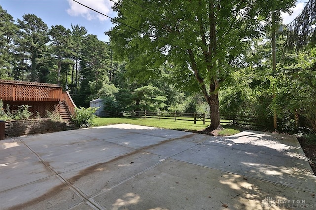 798 Carini Ln, Cincinnati, OH 45218 - view of patio / terrace featuring stairway, a wooden deck, and view of scattered trees
