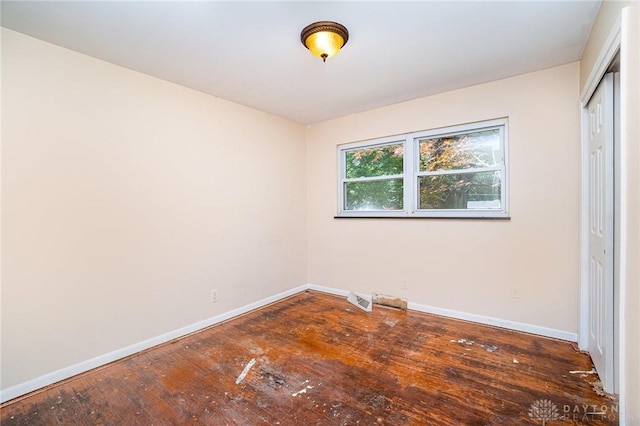4689 Fisher Rd, Franklin, OH 45005 - unfurnished bedroom featuring hardwood / wood-style floors and a closet