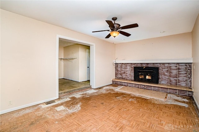 4689 Fisher Rd, Franklin, OH 45005 - unfurnished living room featuring ceiling fan and a fireplace with raised hearth
