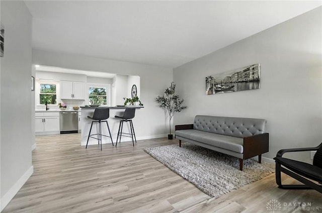 1378 Standish Ave, Riverside, OH 45432 - living area with light wood-style flooring and baseboards