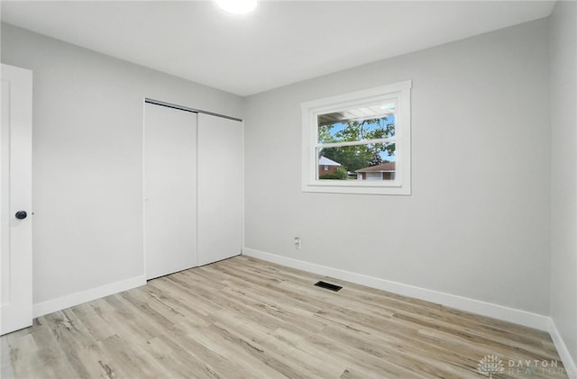 1378 Standish Ave, Riverside, OH 45432 - unfurnished bedroom with wood finished floors and a closet