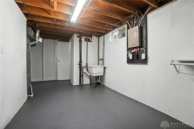 1378 Standish Ave, Riverside, OH 45432 - basement with a sink and electric panel