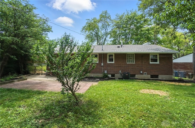 1378 Standish Ave, Riverside, OH 45432 - rear view of house featuring a patio and brick siding
