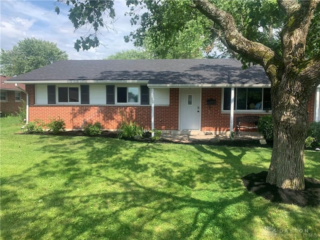 103 W Boitnott Dr, Englewood, OH 45322 - ranch-style home with brick siding, a front lawn, and a shingled roof