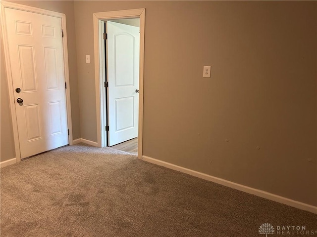 103 W Boitnott Dr, Englewood, OH 45322 - empty room featuring carpet flooring and baseboards