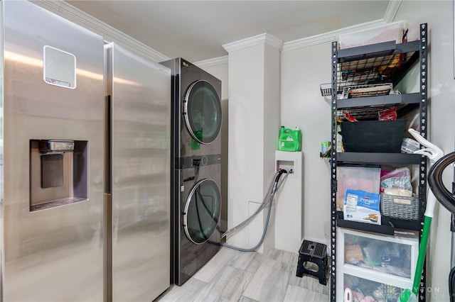 541 E Main St, Xenia, OH 45385 - laundry room with stacked washer / drying machine and ornamental molding