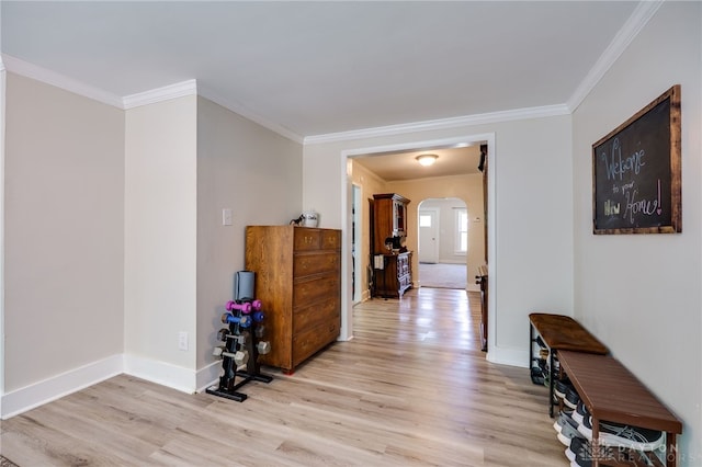 541 E Main St, Xenia, OH 45385 - hallway featuring light wood finished floors, arched walkways, and ornamental molding
