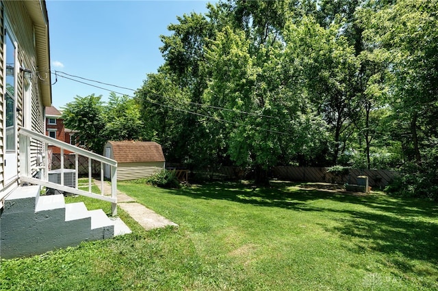 541 E Main St, Xenia, OH 45385 - fenced backyard with a storage shed