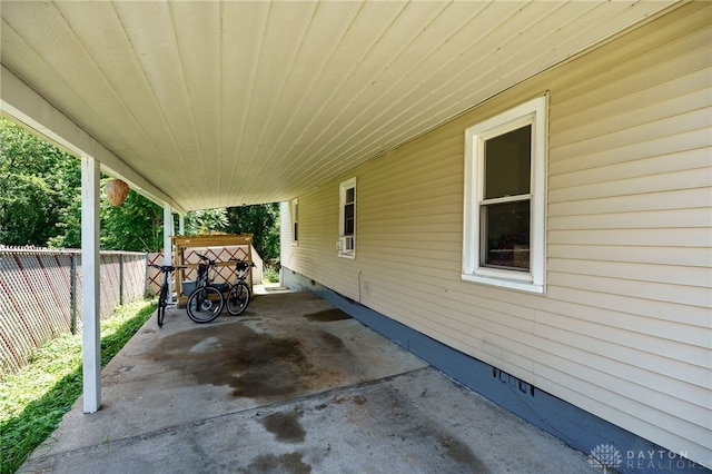 541 E Main St, Xenia, OH 45385 - view of patio featuring a carport and cooling unit