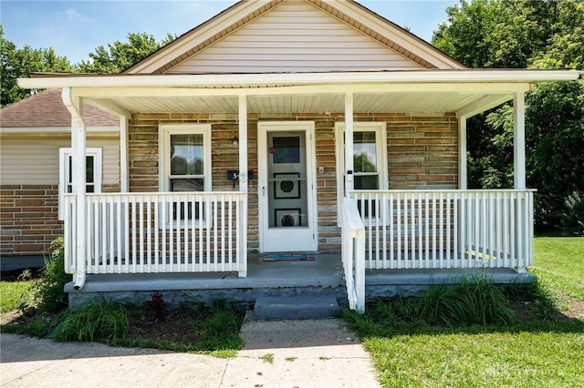 541 E Main St, Xenia, OH 45385 - view of front of property with covered porch and brick siding