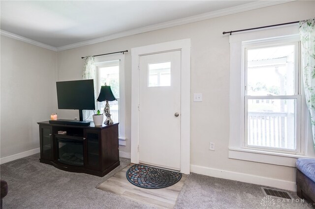 541 E Main St, Xenia, OH 45385 - carpeted entryway featuring crown molding and baseboards