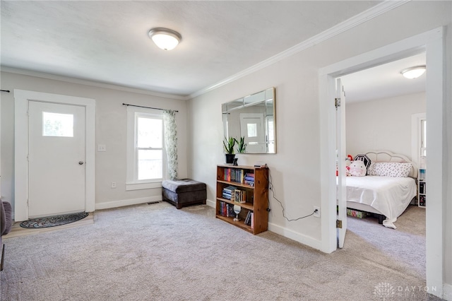 541 E Main St, Xenia, OH 45385 - carpeted entrance foyer featuring crown molding and baseboards