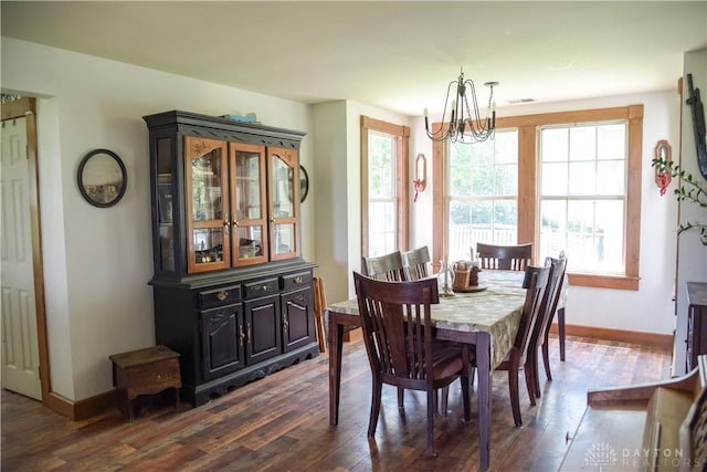 4741 Wolverton Rd, Eaton, OH 45320 - dining space with dark wood finished floors and a chandelier