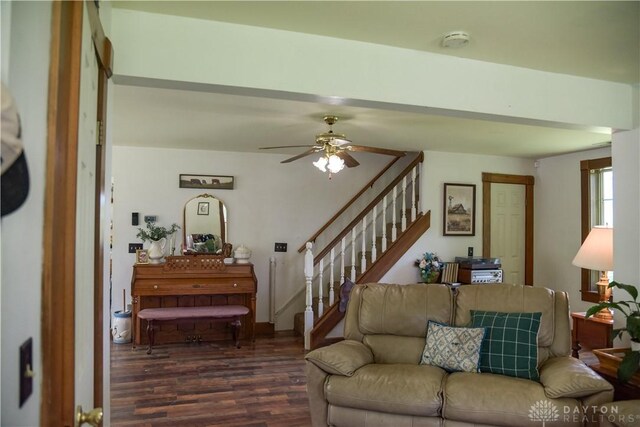 4741 Wolverton Rd, Eaton, OH 45320 - living room with dark wood-type flooring, stairs, and a ceiling fan