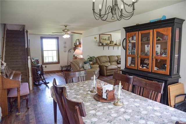 4741 Wolverton Rd, Eaton, OH 45320 - dining space featuring dark wood-type flooring, ceiling fan, and a chandelier