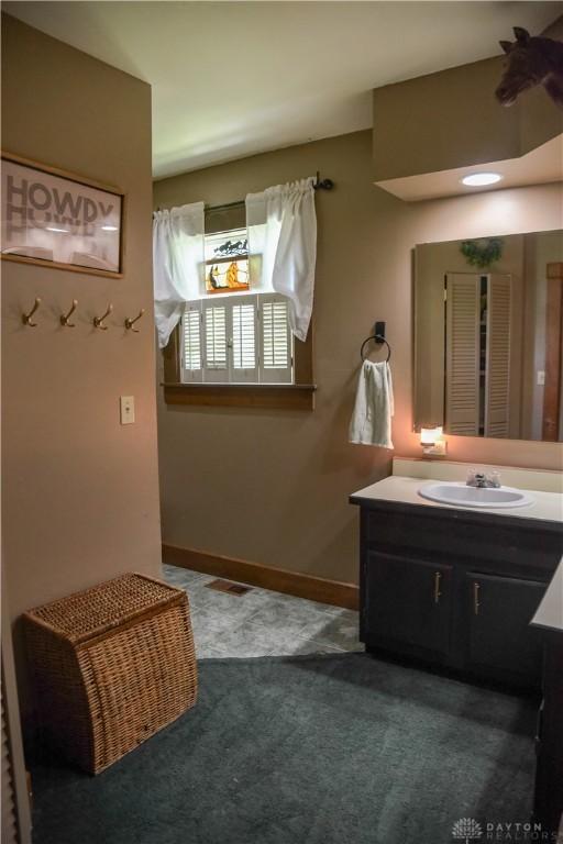 4741 Wolverton Rd, Eaton, OH 45320 - bathroom with vanity and baseboards