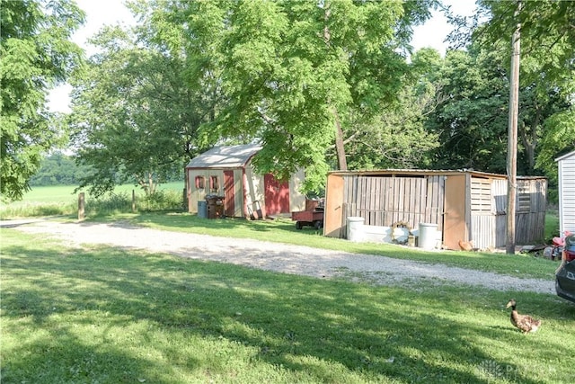 4741 Wolverton Rd, Eaton, OH 45320 - view of green lawn featuring a storage shed