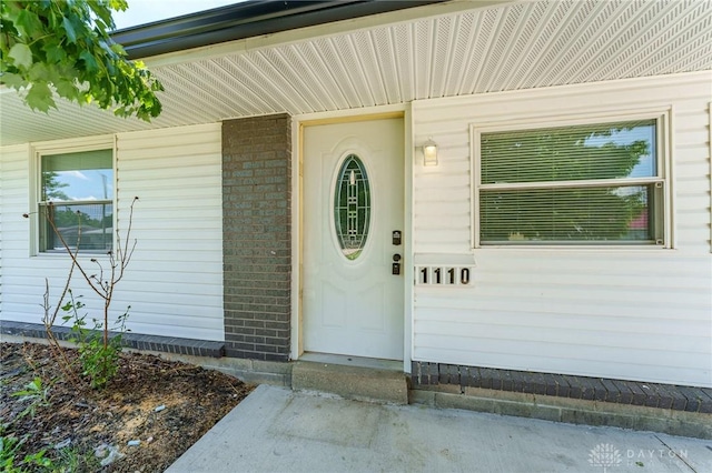 1110 Langdale Ave, New Carlisle, OH 45344 - view of exterior entry with brick siding