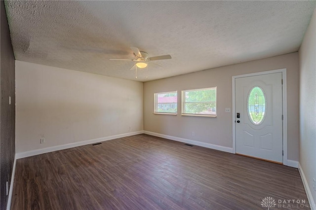 1110 Langdale Ave, New Carlisle, OH 45344 - entryway with a ceiling fan, wood finished floors, and a textured ceiling