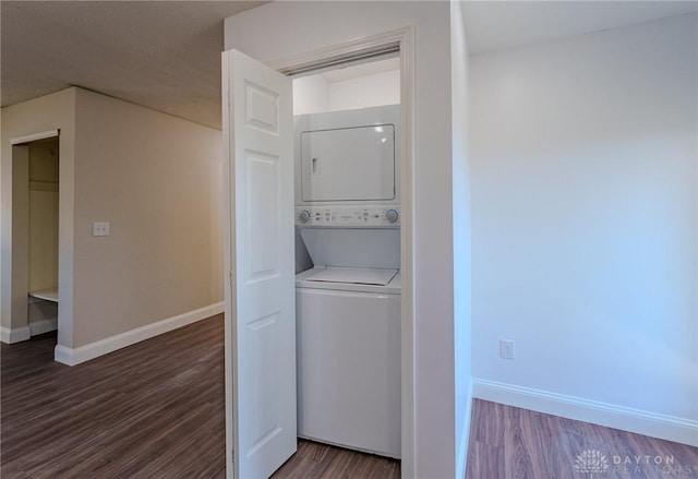 1110 Langdale Ave, New Carlisle, OH 45344 - laundry area with estacked washer and dryer and wood finished floors