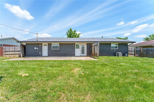 1110 Langdale Ave, New Carlisle, OH 45344 - back of property featuring a patio and brick siding
