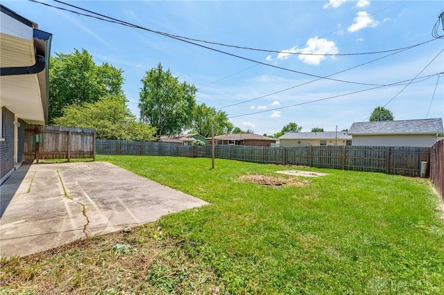 1110 Langdale Ave, New Carlisle, OH 45344 - fenced backyard with a patio