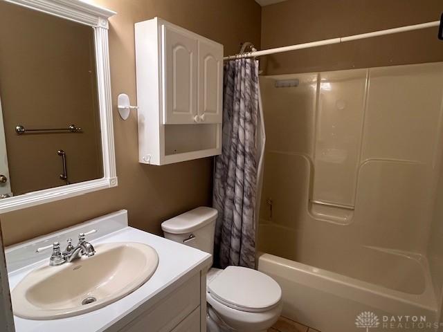 319 Sambor Ct, Piqua, OH 45356 - full bath featuring vanity and shower / bath combo with shower curtain