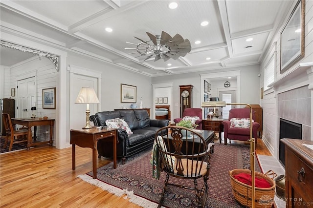 69 Bridge St, Cedarville Twp, OH 45314 - living area featuring coffered ceiling, light wood-style floors, ceiling fan, a tile fireplace, and recessed lighting
