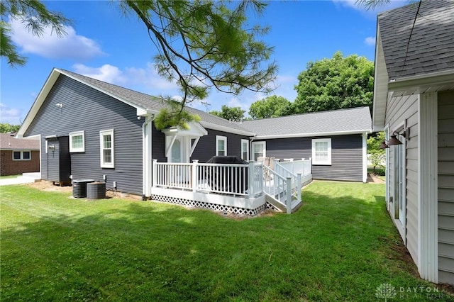69 Bridge St, Cedarville Twp, OH 45314 - back of house with a yard, a deck, and a shingled roof