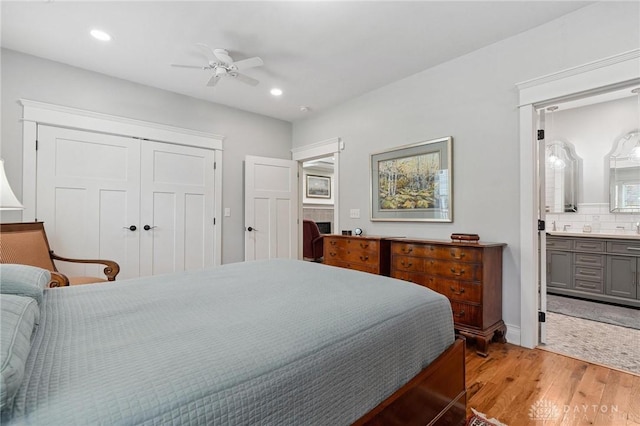 69 Bridge St, Cedarville Twp, OH 45314 - bedroom with light wood-type flooring, a closet, recessed lighting, ensuite bath, and ceiling fan